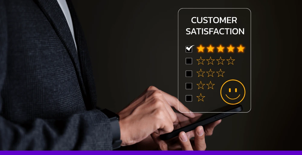Business professional using a smartphone to give a five-star customer satisfaction rating.